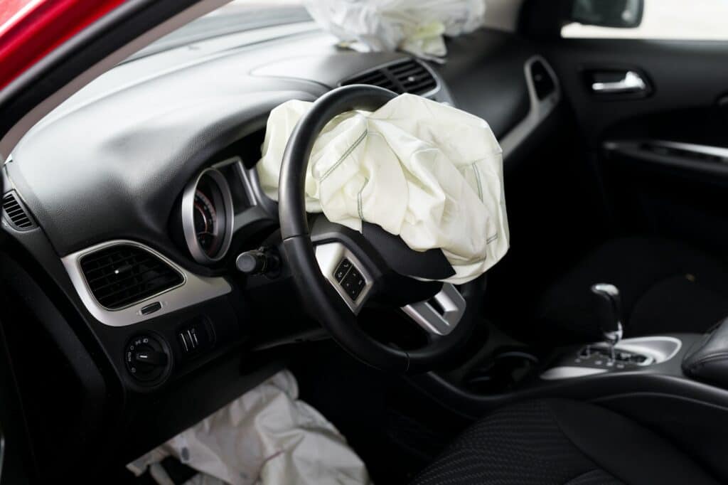 Airbag exploded at a car accident. Car Crash